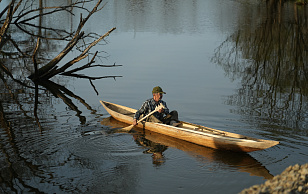A MAN AND A BOAT